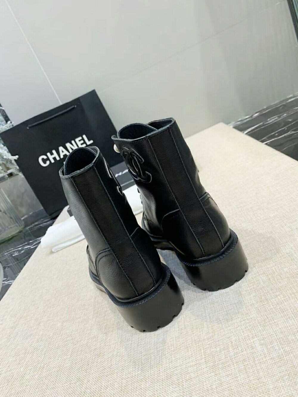 CHANEL BLACK LEATHER COMBAT BOOTS WITH PEARL DETAILING ON TOP - Image 5