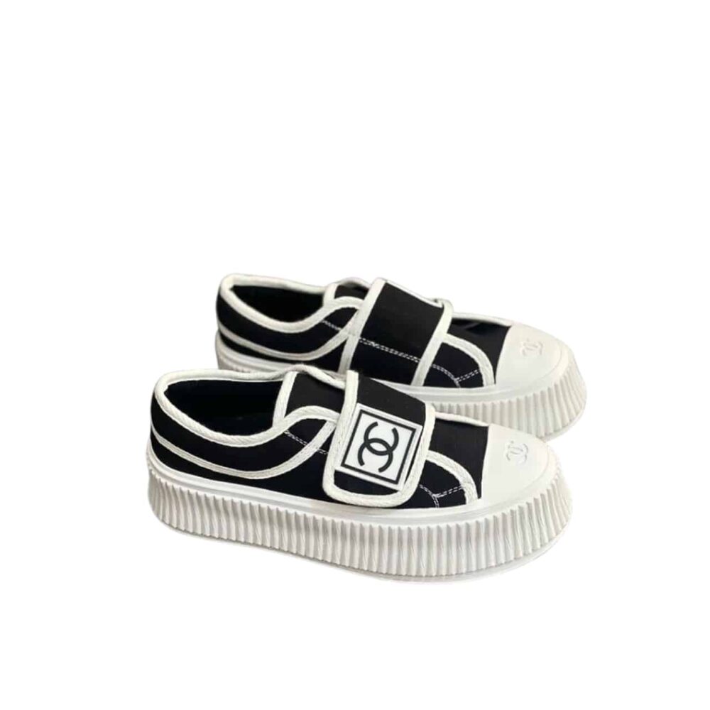 CHANEL WHITE CC CAP TOE SLIPON SNEAKER BLACK