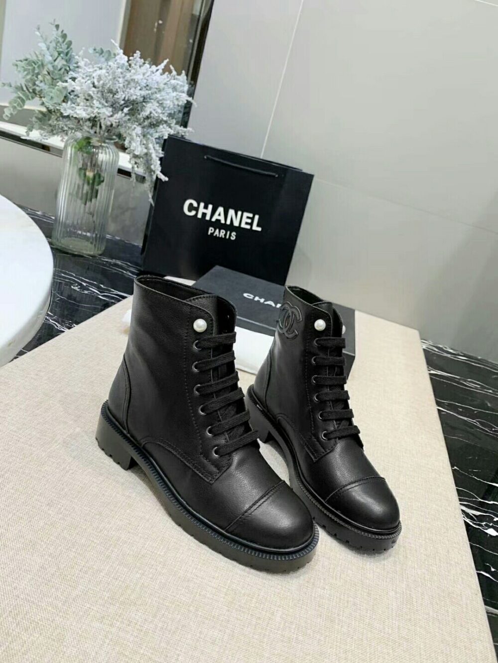 CHANEL BLACK LEATHER COMBAT BOOTS WITH PEARL DETAILING ON TOP - Image 2