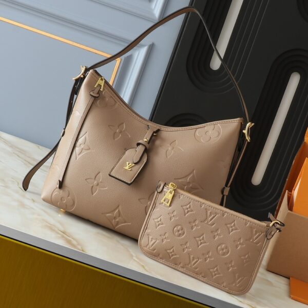 LOUIS VUITTON CARRYALL PM MONOGRAM EMPREINTE TURTLEDOVE - Image 3