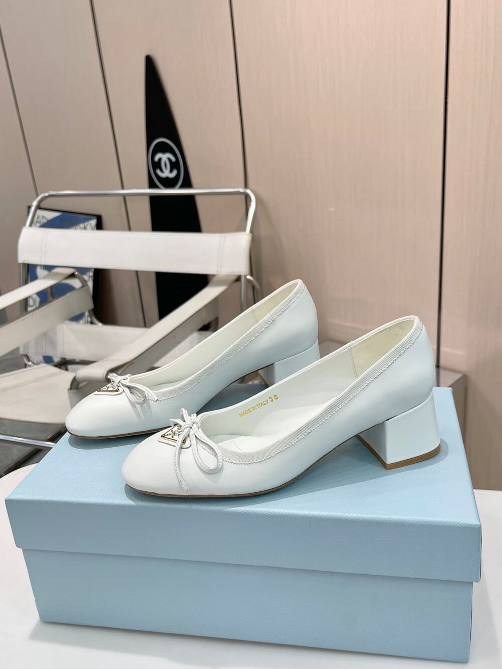 PRADA TRIANGLE LOGO BOW PUMP IN WHITE - Image 2